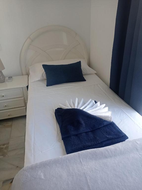 Posteľ alebo postele v izbe v ubytovaní 31 Mijas Playa Club townhouse La Cala