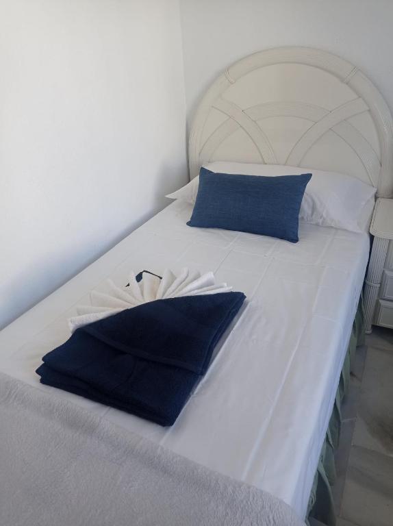Posteľ alebo postele v izbe v ubytovaní 31 Mijas Playa Club townhouse La Cala