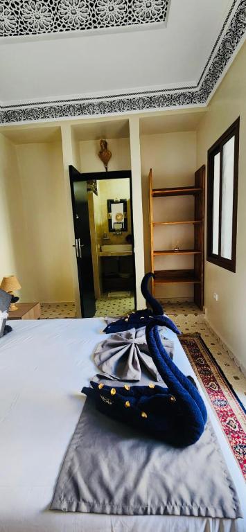 Postel nebo postele na pokoji v ubytování Riad Amazing