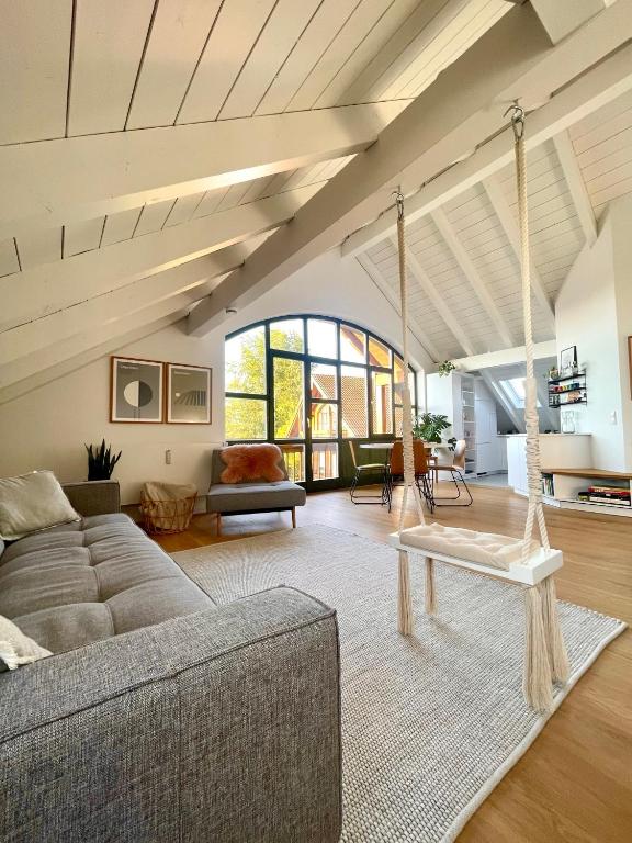 Posezení v ubytování Gemütliches Loft