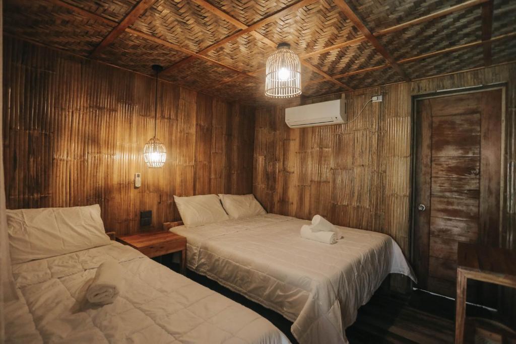 Postel nebo postele na pokoji v ubytování Marika Resort