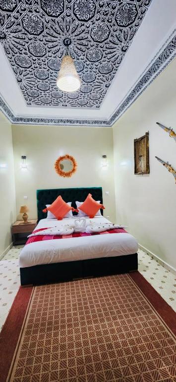 Postel nebo postele na pokoji v ubytování Riad Amazing