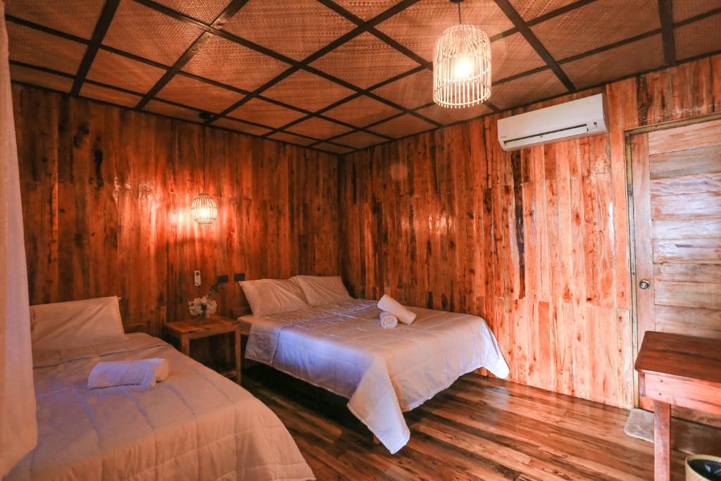 Postel nebo postele na pokoji v ubytování Marika Resort