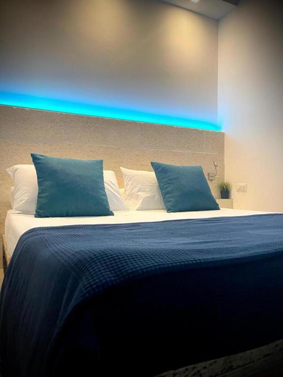 Postel nebo postele na pokoji v ubytování Casa Manfredi - Manfredi Homes&Villas