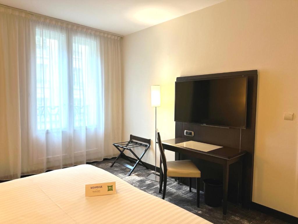TV a/nebo společenská místnost v ubytování Ibis Styles Metz Centre Gare