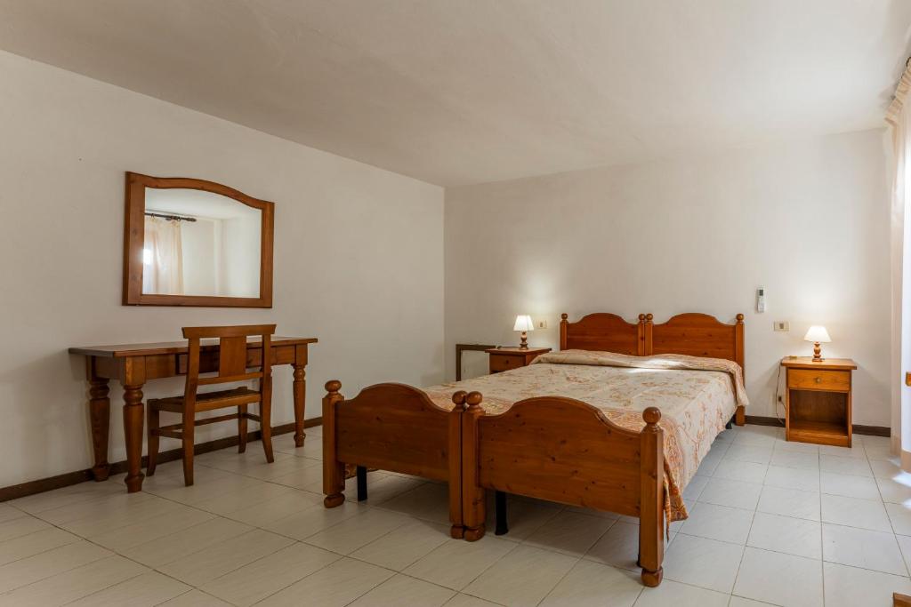Postel nebo postele na pokoji v ubytování Argentario Giannella Apartment