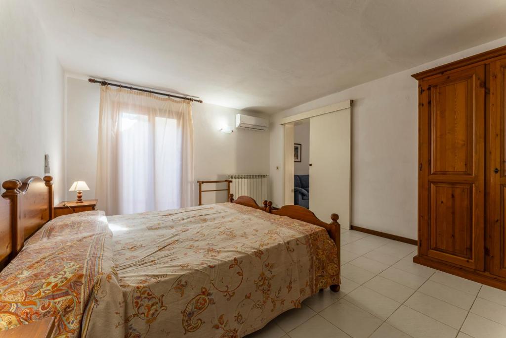 Postel nebo postele na pokoji v ubytování Argentario Giannella Apartment