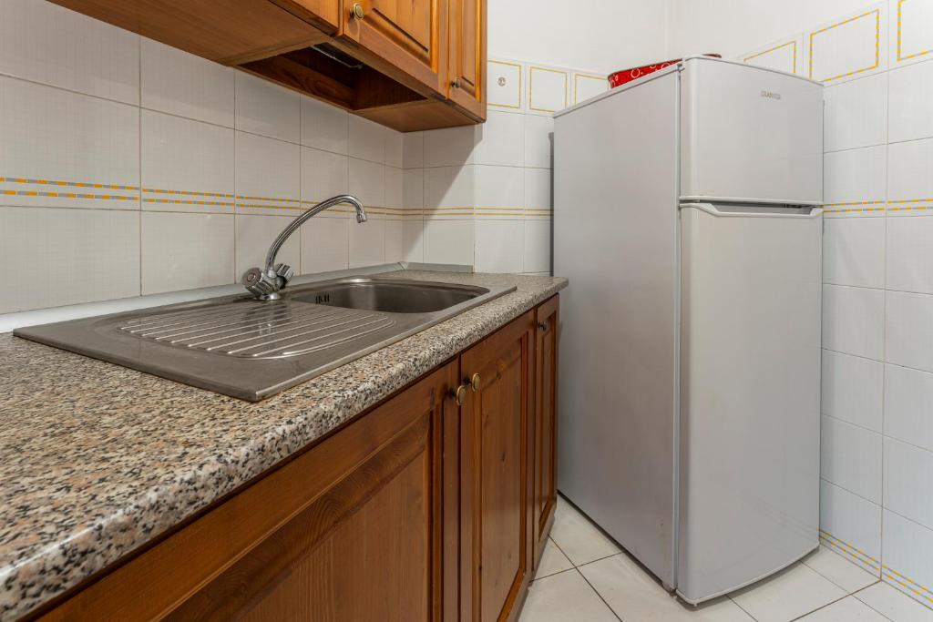 Kuchyň nebo kuchyňský kout v ubytování Argentario Giannella Apartment