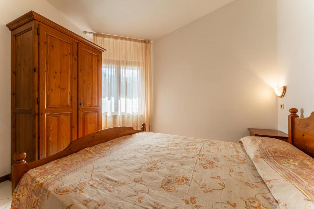 Postel nebo postele na pokoji v ubytování Argentario Giannella Apartment