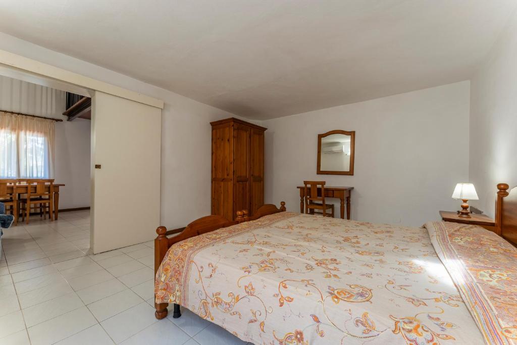 Postel nebo postele na pokoji v ubytování Argentario Giannella Apartment
