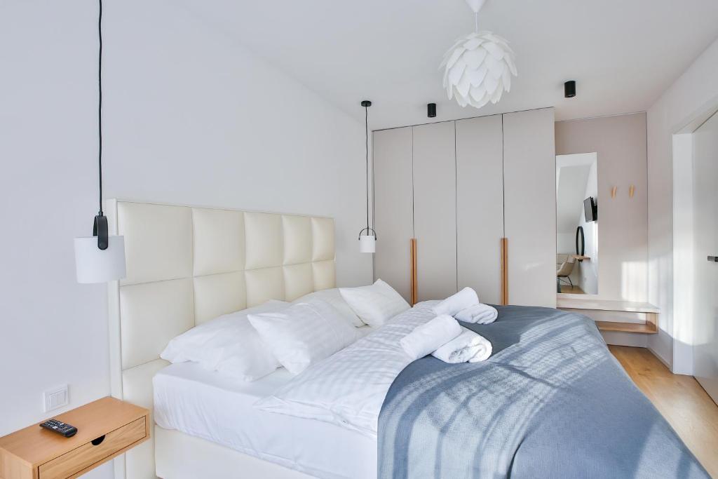 Postel nebo postele na pokoji v ubytování Apartmány Lipno Přední Výtoň