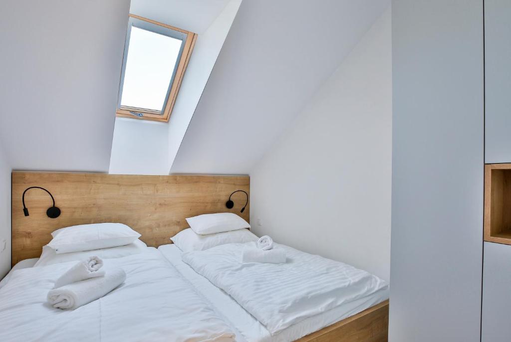 Postel nebo postele na pokoji v ubytování Apartmány Lipno Přední Výtoň