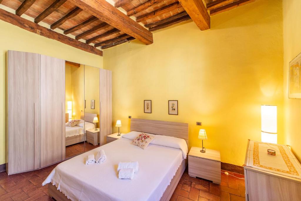 Postel nebo postele na pokoji v ubytování Casa nel Corso Holiday Home