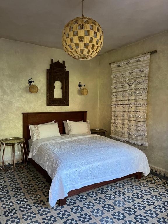Postel nebo postele na pokoji v ubytování Boutique Guesthouse Dar Zohra