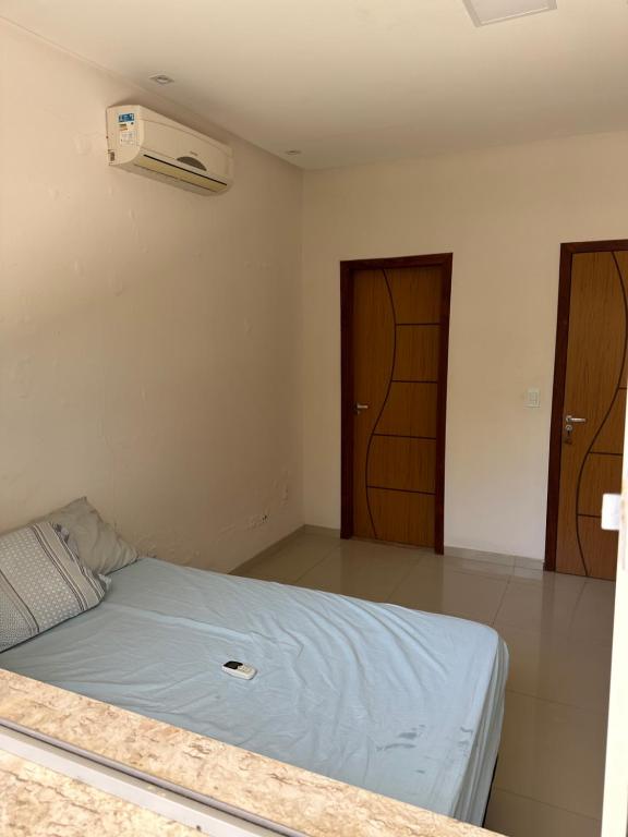 Postel nebo postele na pokoji v ubytování Casa sítio