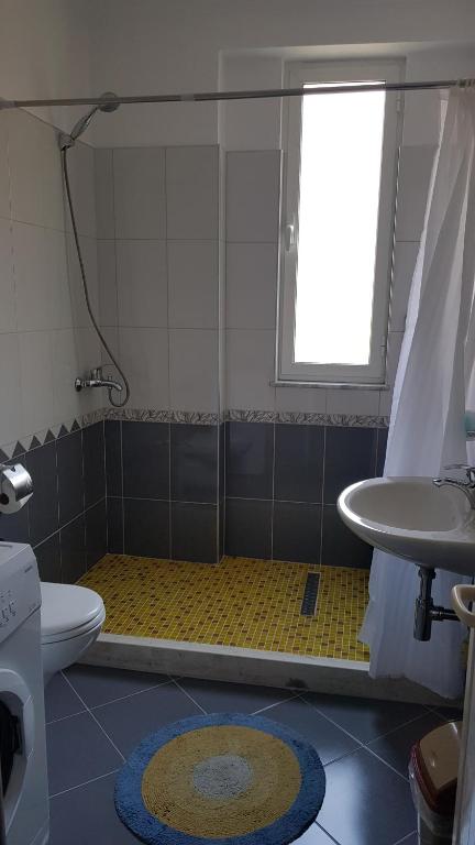 Koupelna v ubytování Villa Arberia
