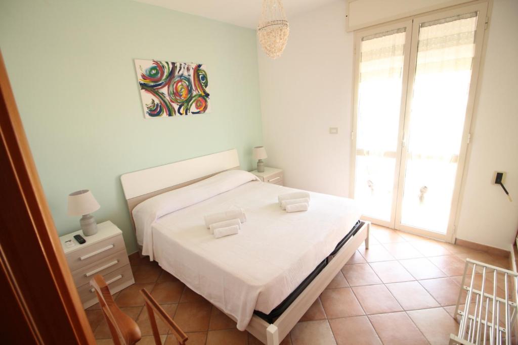 Postel nebo postele na pokoji v ubytování Mare Di Pazze