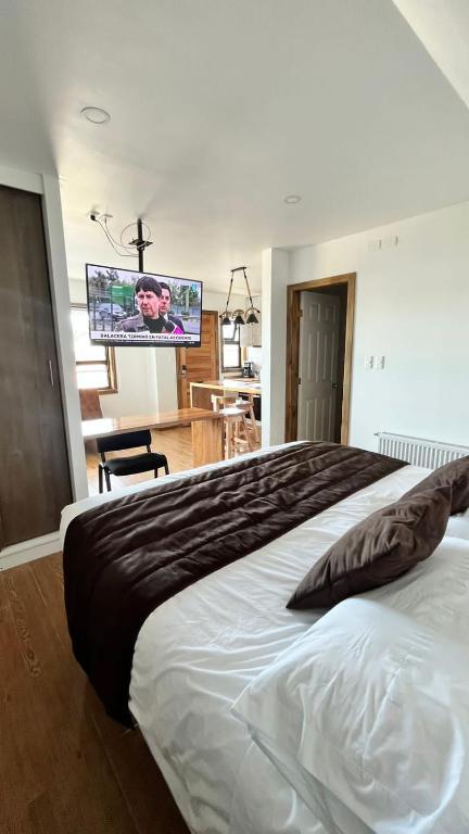 Postel nebo postele na pokoji v ubytování Origenes Apartments