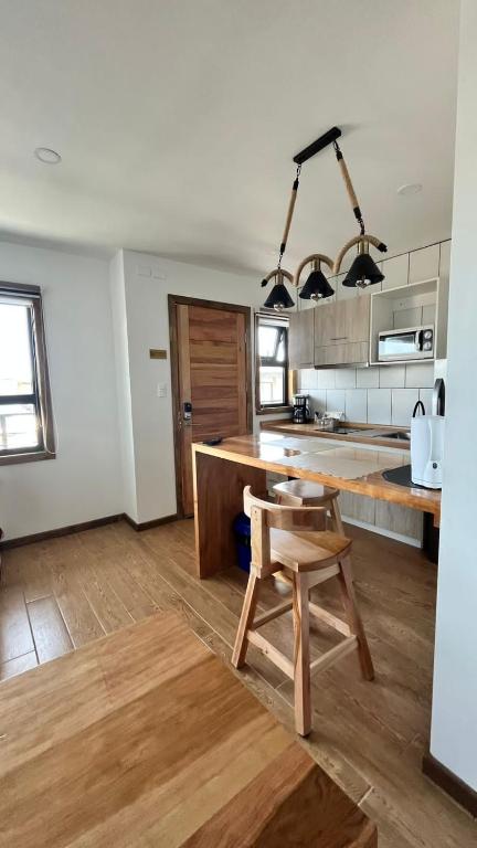 Kuchyň nebo kuchyňský kout v ubytování Origenes Apartments