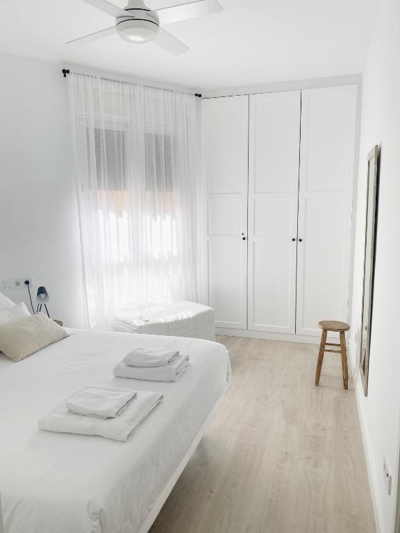 A bed or beds in a room at Smart Stay Córdoba, Zona Centro