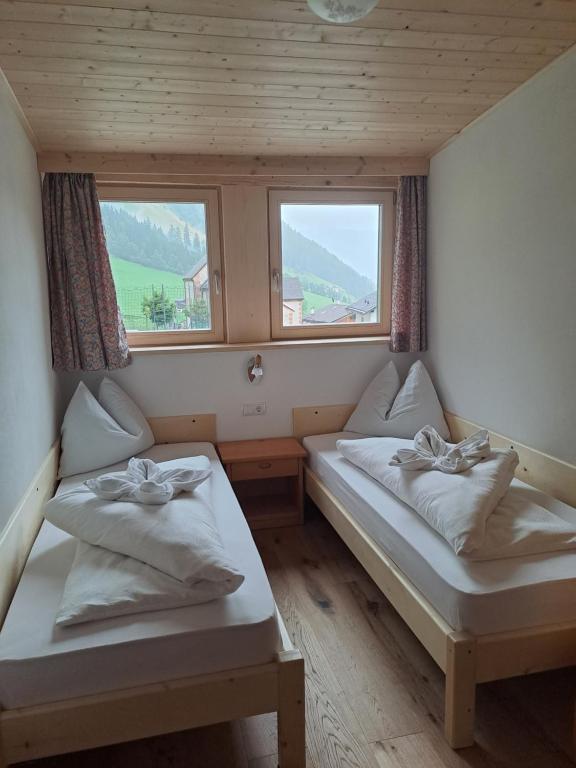 Postel nebo postele na pokoji v ubytování Stanishof