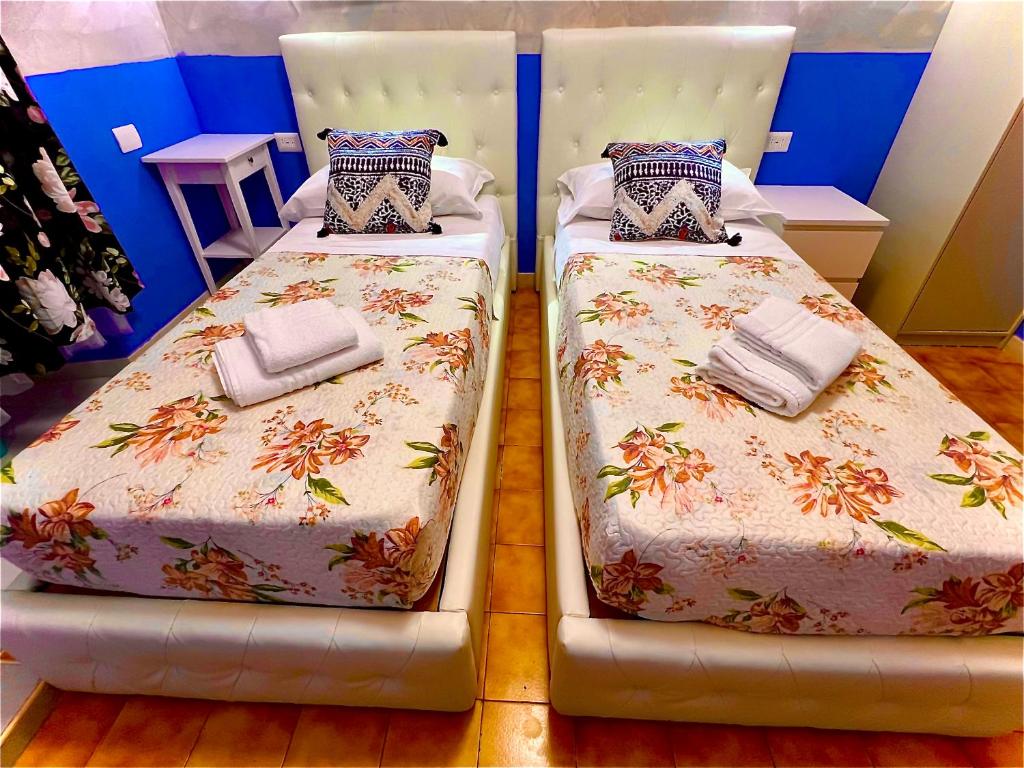 Posteľ alebo postele v izbe v ubytovaní Relaxon Guest House