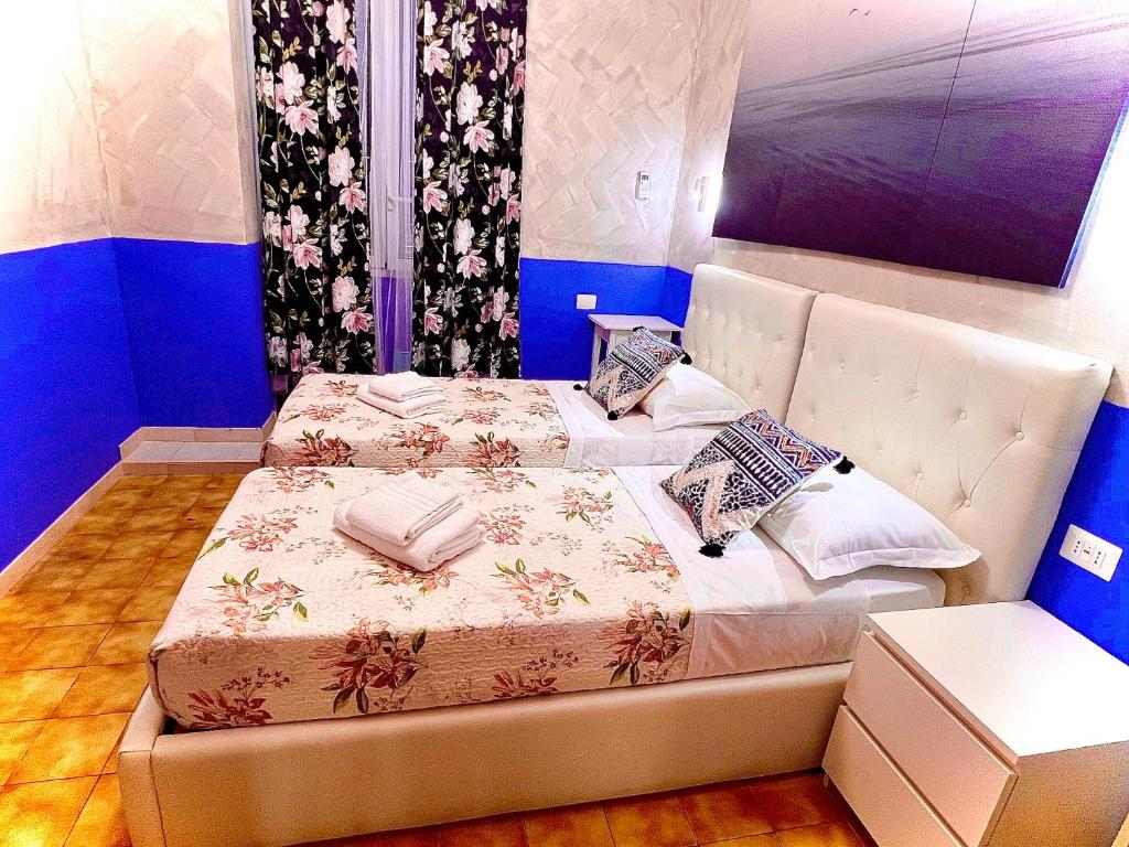 Posteľ alebo postele v izbe v ubytovaní Relaxon Guest House