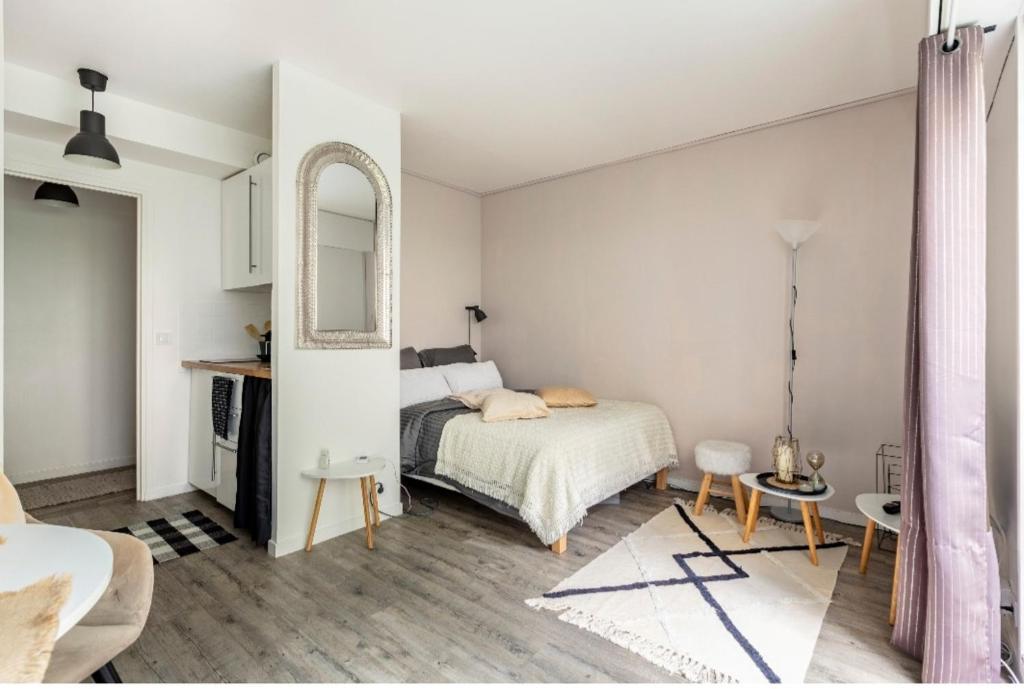 Kuchyňa alebo kuchynka v ubytovaní Appartement Cosy Paris centre