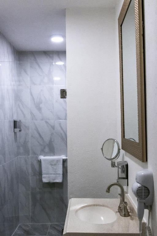 Koupelna v ubytování Hotel Arthemisa