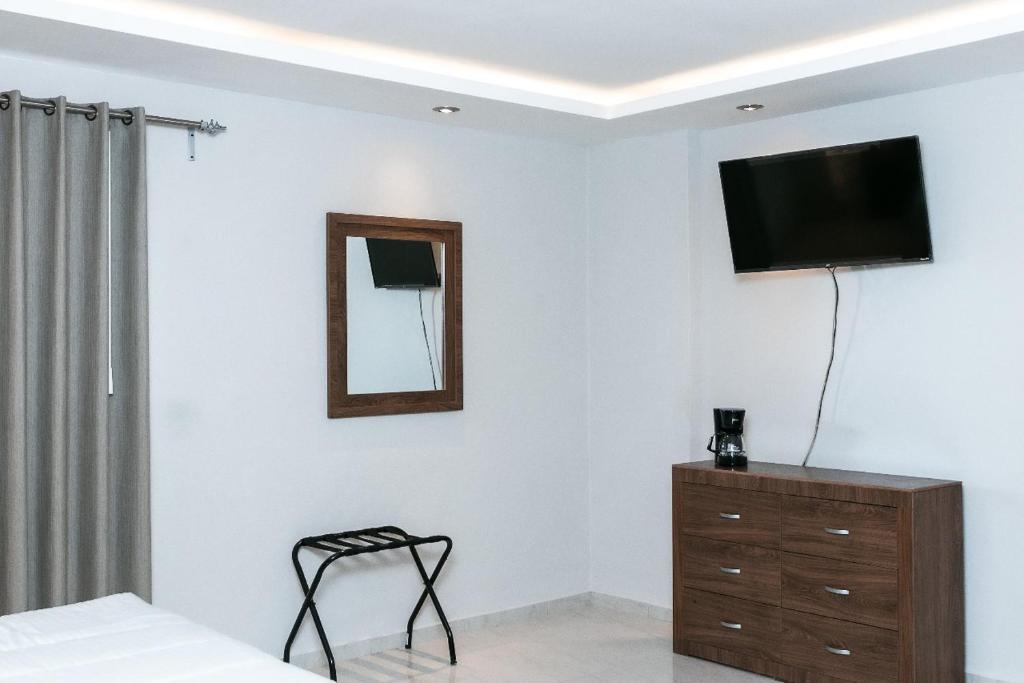TV a/nebo společenská místnost v ubytování Hotel Arthemisa