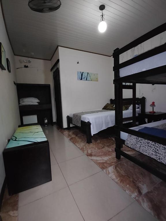 Postel nebo postele na pokoji v ubytování Salamandra Costa Rica