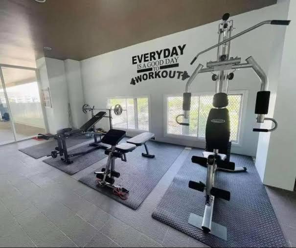 a gym with several exercise bikes and a sign that reads everyday workout at Avida Studio unit in Davao City