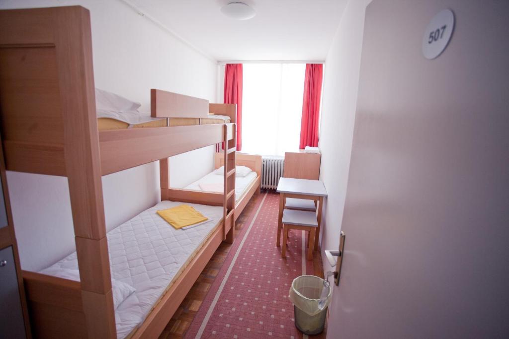 Postel nebo postele na pokoji v ubytování HI Hostel Zagreb