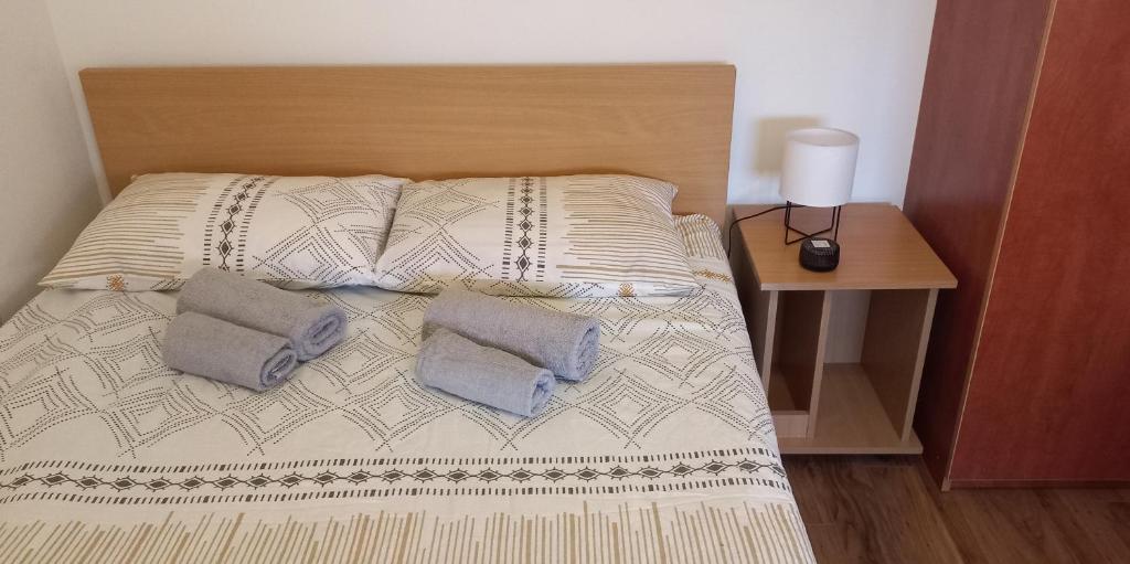 Postel nebo postele na pokoji v ubytování Divčibare Snežna Kraljica ap 13