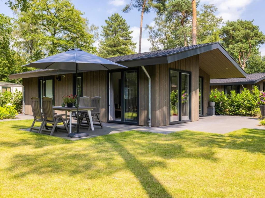 Taman di luar Lodge in Netherlands with Furnished Terrace
