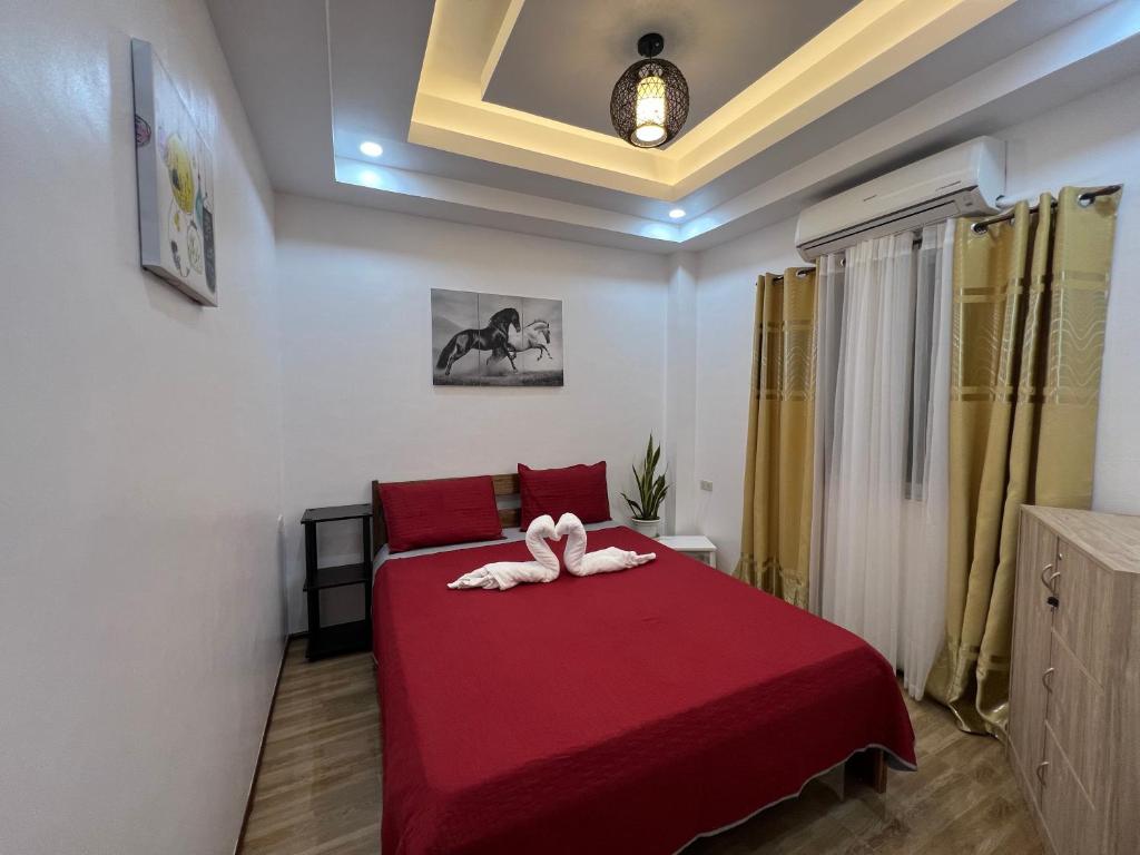 Postel nebo postele na pokoji v ubytování RICH-VANIA SUITES