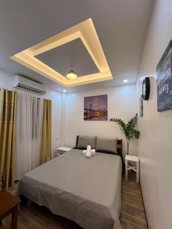 Postel nebo postele na pokoji v ubytování RICH-VANIA SUITES