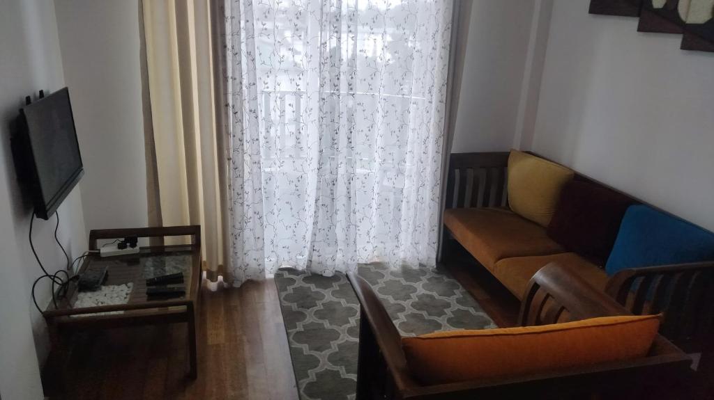 TV a/nebo společenská místnost v ubytování Nuwara eliya Luxury Apartment