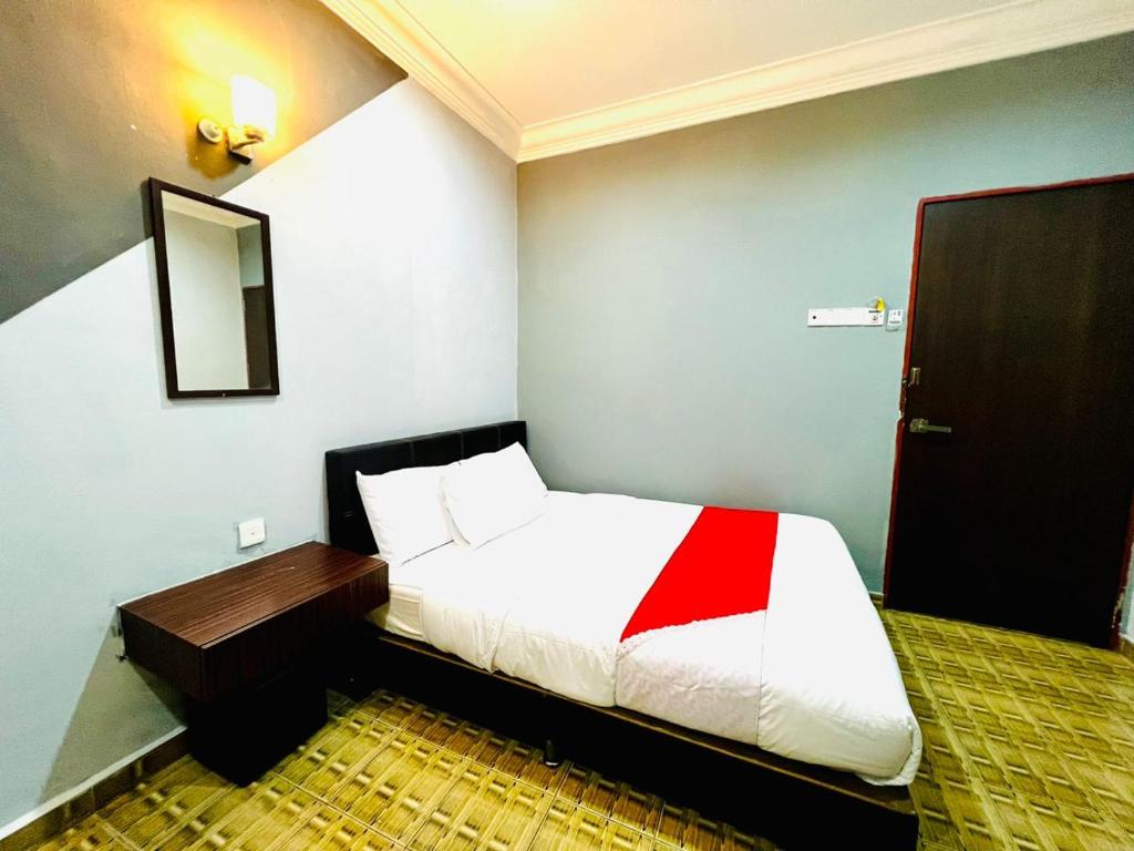 Postel nebo postele na pokoji v ubytování DAILY INN HOTEL