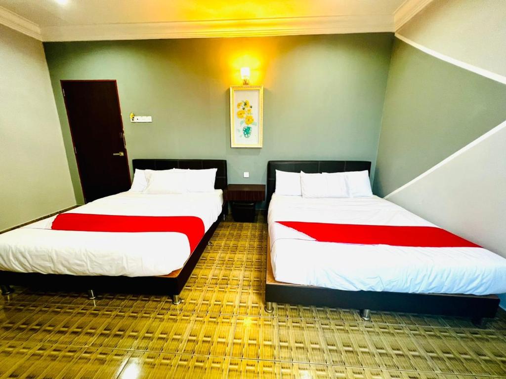 Postel nebo postele na pokoji v ubytování DAILY INN HOTEL