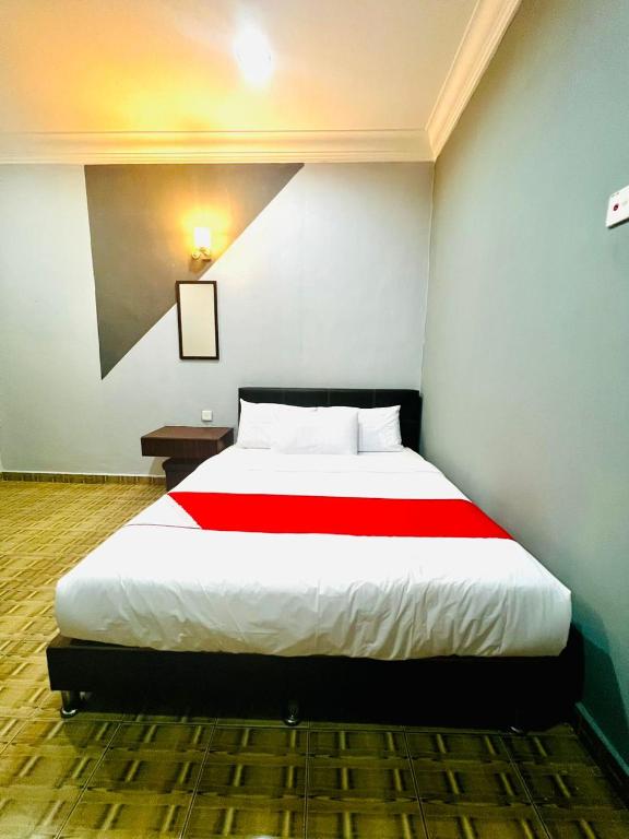 Postel nebo postele na pokoji v ubytování DAILY INN HOTEL