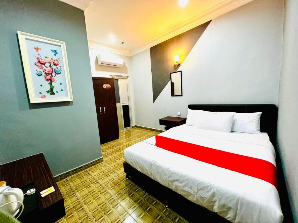 Postel nebo postele na pokoji v ubytování DAILY INN HOTEL