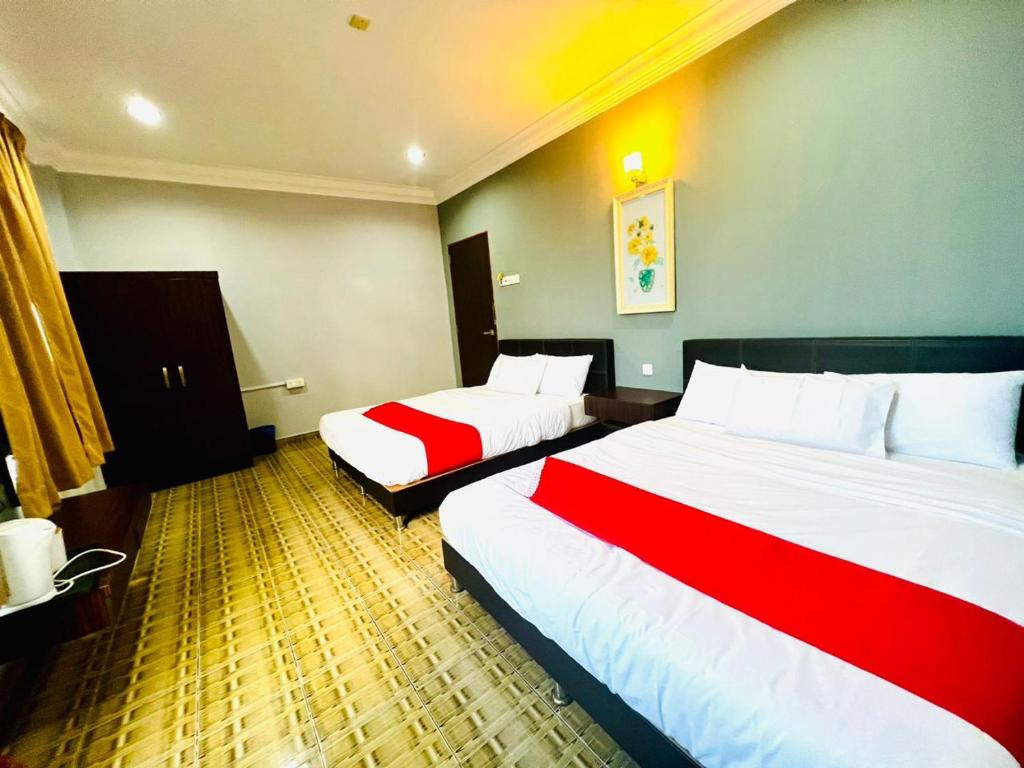 Postel nebo postele na pokoji v ubytování DAILY INN HOTEL