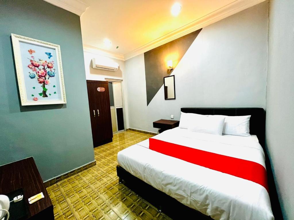 Postel nebo postele na pokoji v ubytování DAILY INN HOTEL