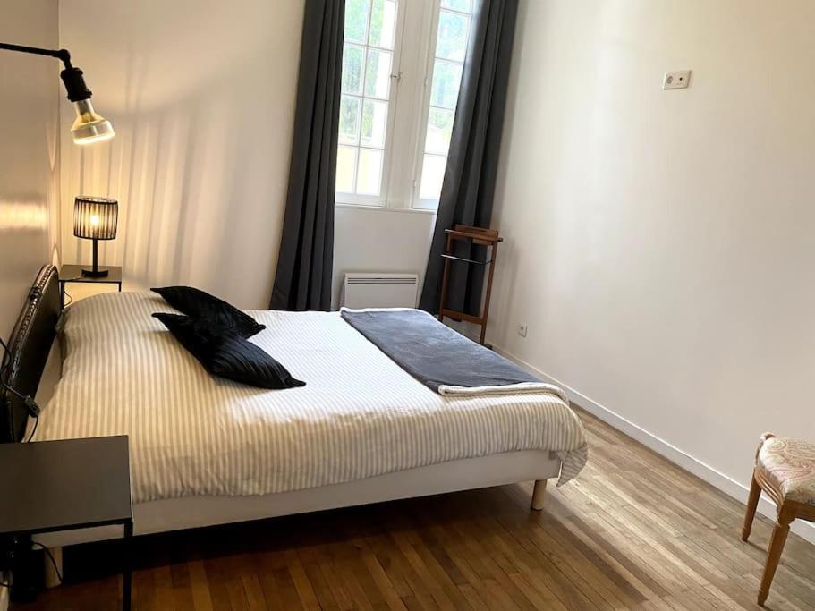 Postel nebo postele na pokoji v ubytování Le Brighton