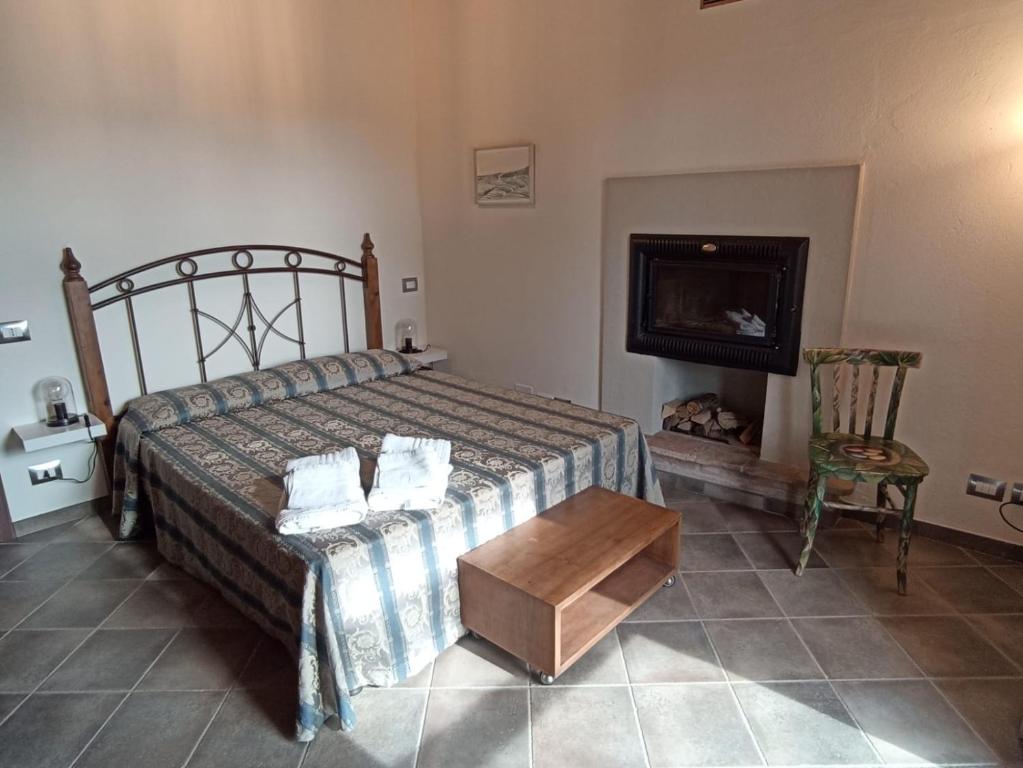 Postel nebo postele na pokoji v ubytování Nutrilamente country house