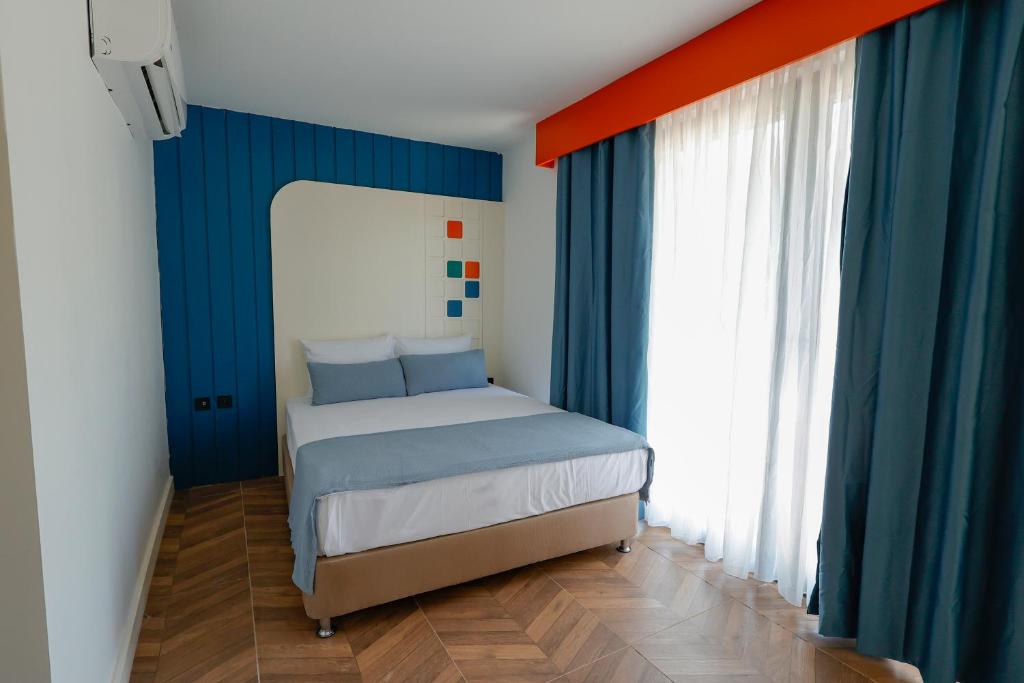 Postel nebo postele na pokoji v ubytování Forest In Hotel