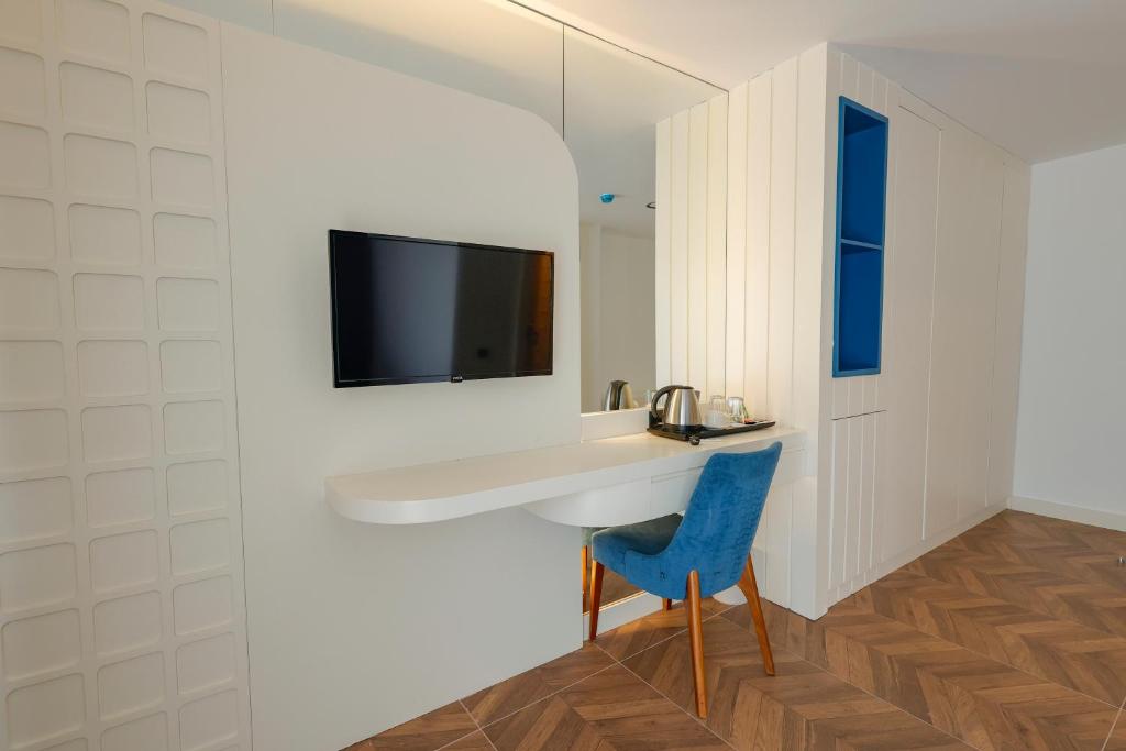 TV a/nebo společenská místnost v ubytování Forest In Hotel