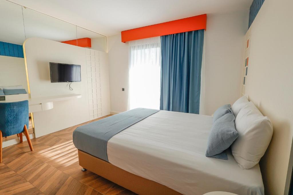 Postel nebo postele na pokoji v ubytování Forest In Hotel