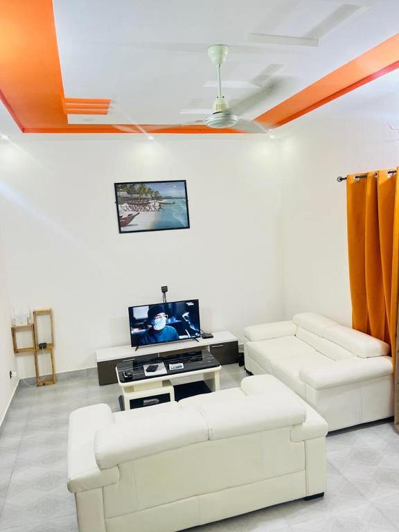 Et tv og/eller underholdning på Charly-Calavi Appartement